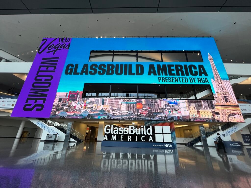 GlassBuild America signage and Las Vegas welcome display in the convention center lobby